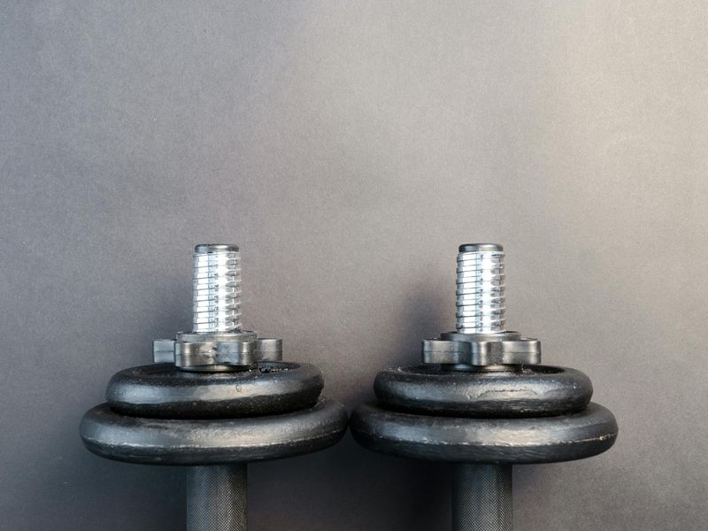 Detailed view of fitness equipment and heavy dumbbells
