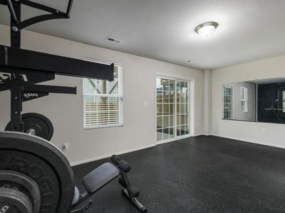 Modern minimalist gym interior with professional weights